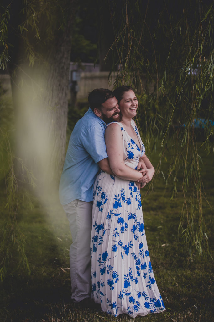 blue floral dress, summer engagement session, summer photo shoot, outdoor engagement session, moody engagement session, moody engagement photos, moody engagement photo session, film style engagement session, film style engagement photos, film engagement shoot, film engagement photos, whimsical engagement shoot, coastal engagement session, costal engagement photos, beach engagement, park engagement, moody engagement, candid engagement, Brandford, CT, Guildford, CT, Connecticut photos, Connecticut Engagement, CT Engagement