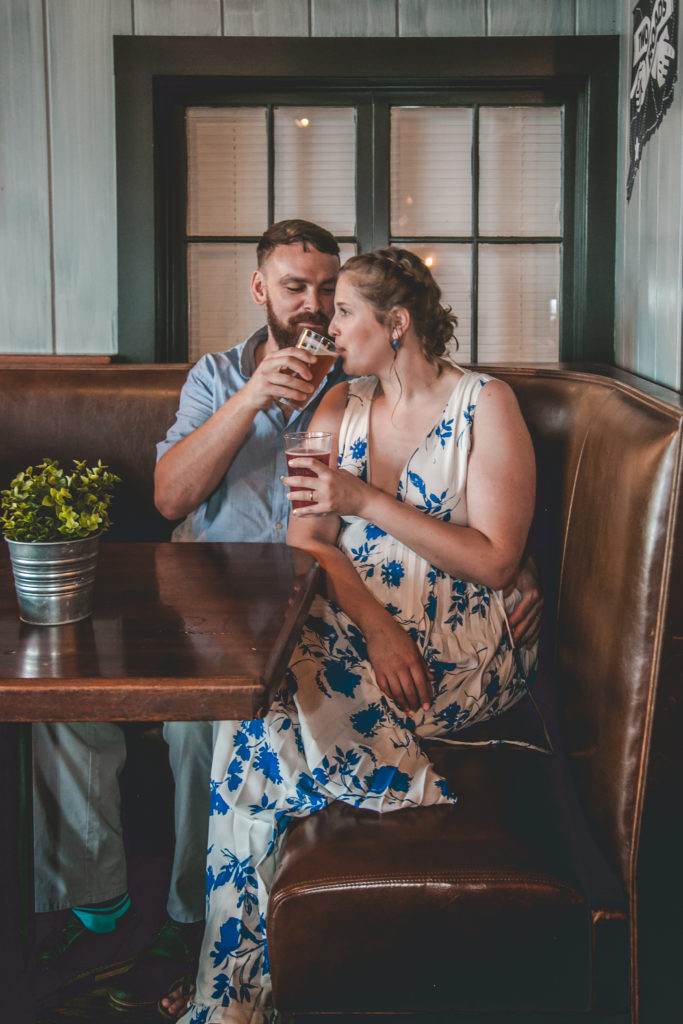 blue floral dress, summer engagement session, summer photo shoot, outdoor engagement session, moody engagement session, moody engagement photos, moody engagement photo session, film style engagement session, film style engagement photos, film engagement shoot, film engagement photos, whimsical engagement shoot, coastal engagement session, costal engagement photos, beach engagement, park engagement, moody engagement, candid engagement, Brandford, CT, Guildford, CT, Connecticut photos, Connecticut Engagement, CT Engagement, brewery engagement, beer engagement photos, beer lovers