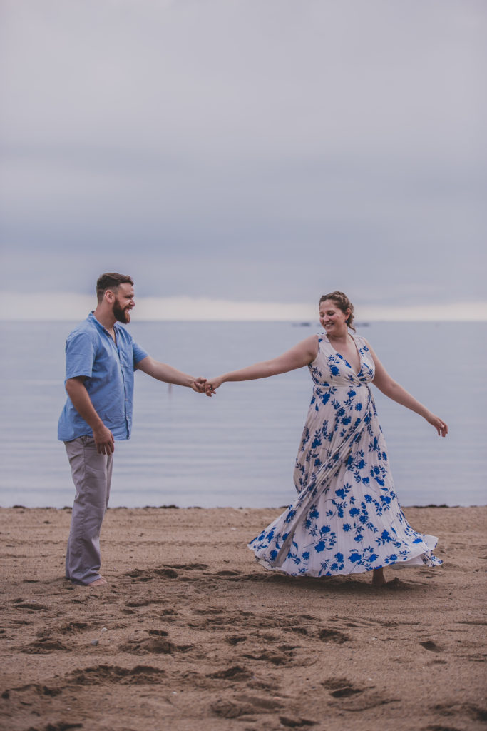 blue floral dress, summer engagement session, summer photo shoot, outdoor engagement session, moody engagement session, moody engagement photos, moody engagement photo session, film style engagement session, film style engagement photos, film engagement shoot, film engagement photos, whimsical engagement shoot, coastal engagement session, costal engagement photos, beach engagement, park engagement, moody engagement, candid engagement, Brandford, CT, Guildford, CT, Connecticut photos, Connecticut Engagement, CT Engagement